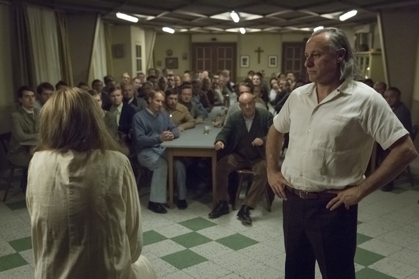 Paul Schäfer (MICHAEL NYQVIST), Doro (JEANNE WERNER) and Colonia men in “Colonia”.