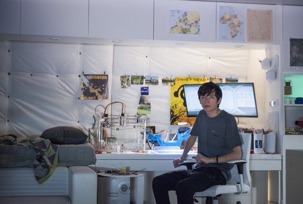 Gardner Elliot (Asa Butterfield) in his room on East Texas, Mars